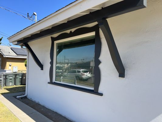 Brighter Coast Solutions professional window cleaning service in action at a San Diego property